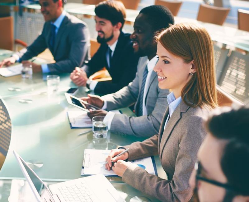 Participants in a roundtable meeting