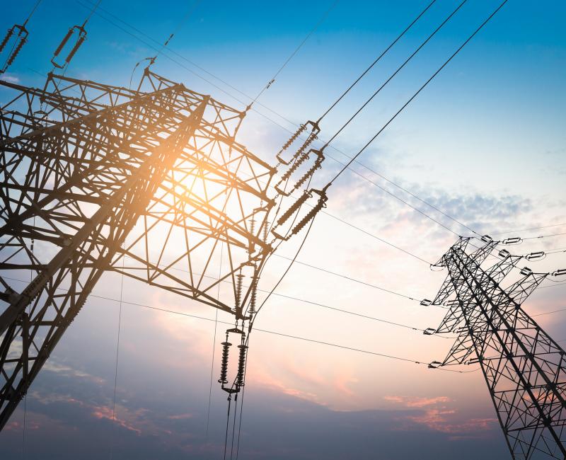 Power transmission tower in sunset