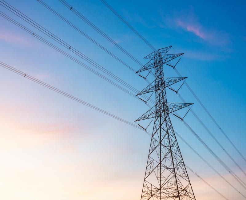 Power transmission tower in sunset