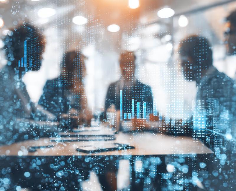 Team meeting with data overlay